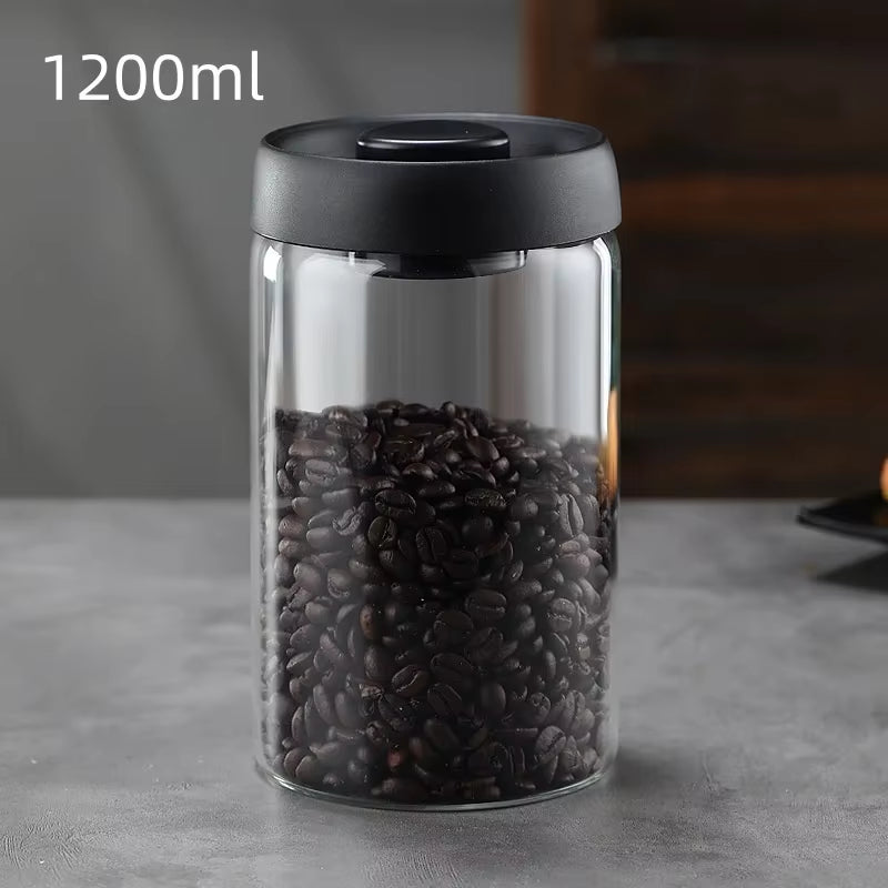 1200 ml borosilicate glass vacuum canister with black lid filled with coffee beans